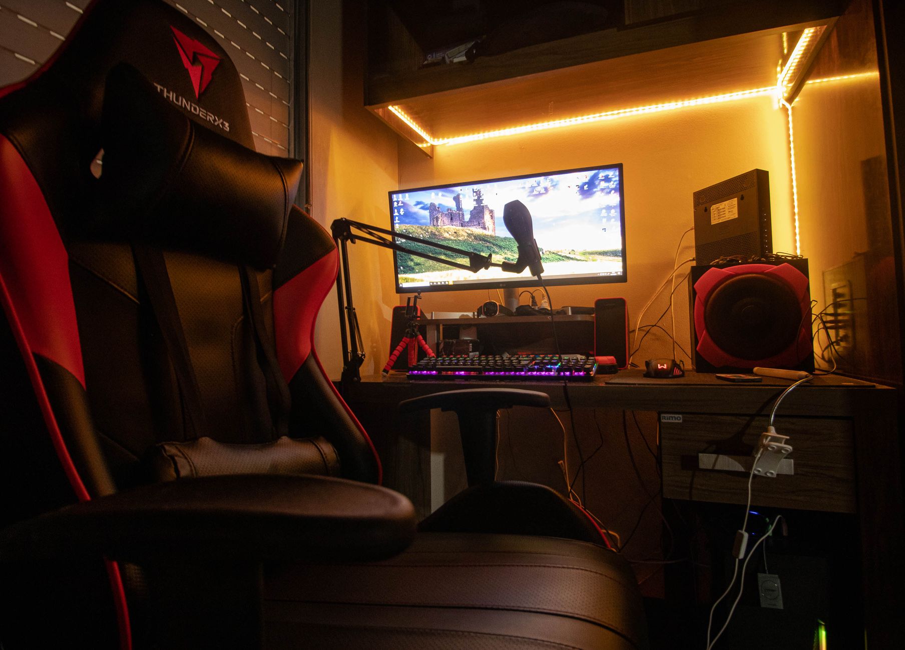 Gaming desk with glowing keyboard